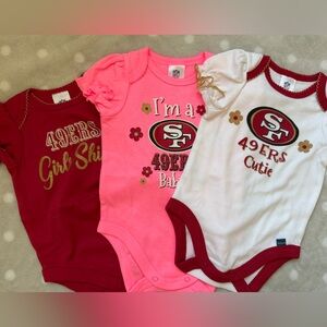 Set of Baby San Francisco Niners Onesies.